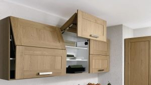  How to adjust the hinges on the doors of the kitchen cabinet