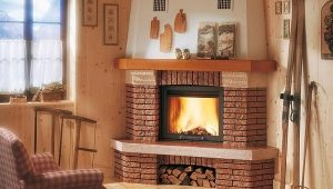  Corner fireplace in a wooden house