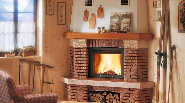 Corner fireplace in a wooden house