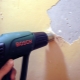  콘크리트 벽에서 페인트를 빨리 제거하는 방법?